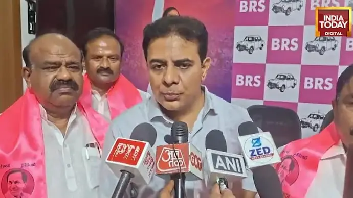 KTR challenges Revanth Reddy to face polls amid BRS survey claims